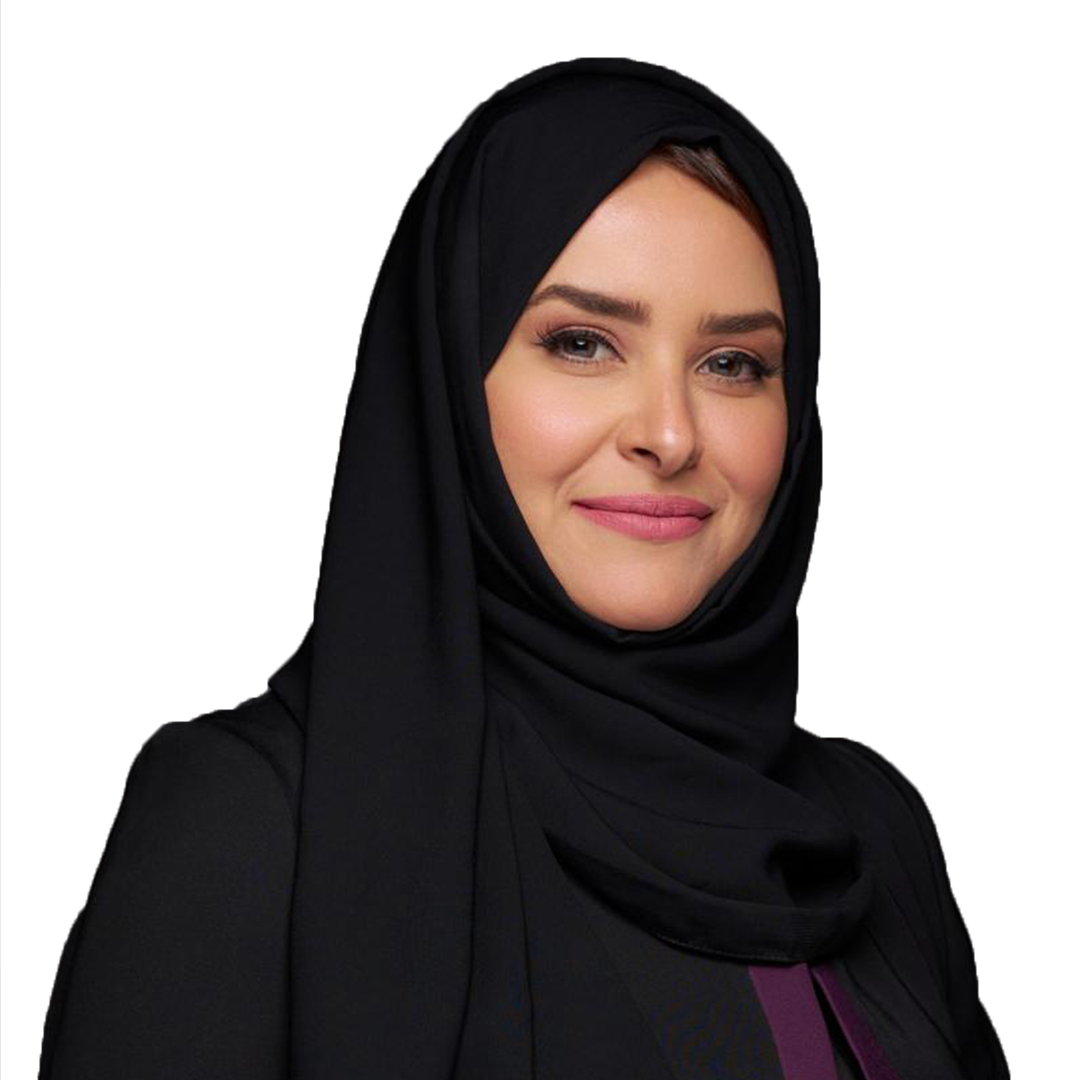 Person wearing black abaya and hijab with formal attire on white background